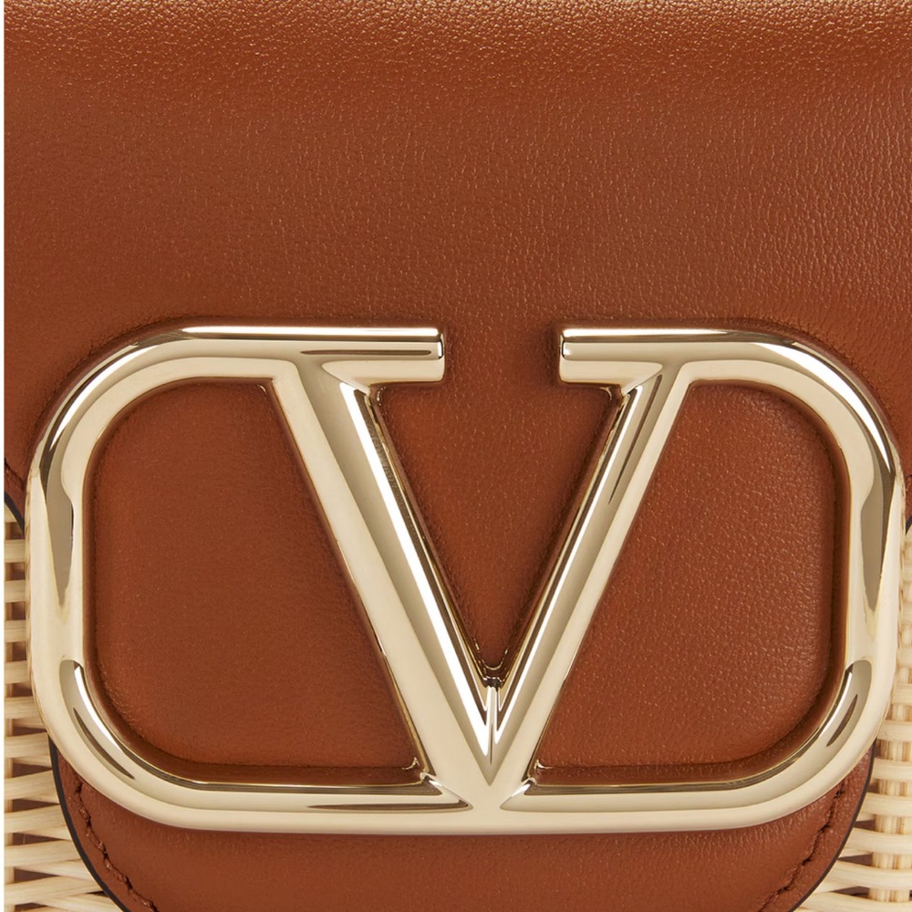 VALENTINO GARAVANI
Logo embellished leather-trimmed raffia shoulder bag - Picture 6 of 8